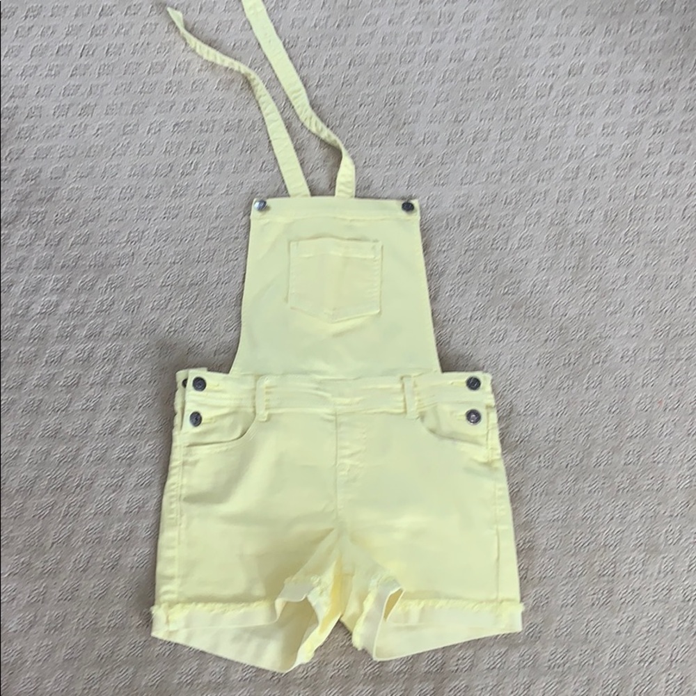 yellow overalls